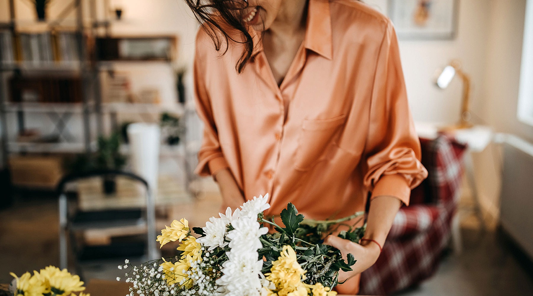 Lifestyle photo of woman with flowers